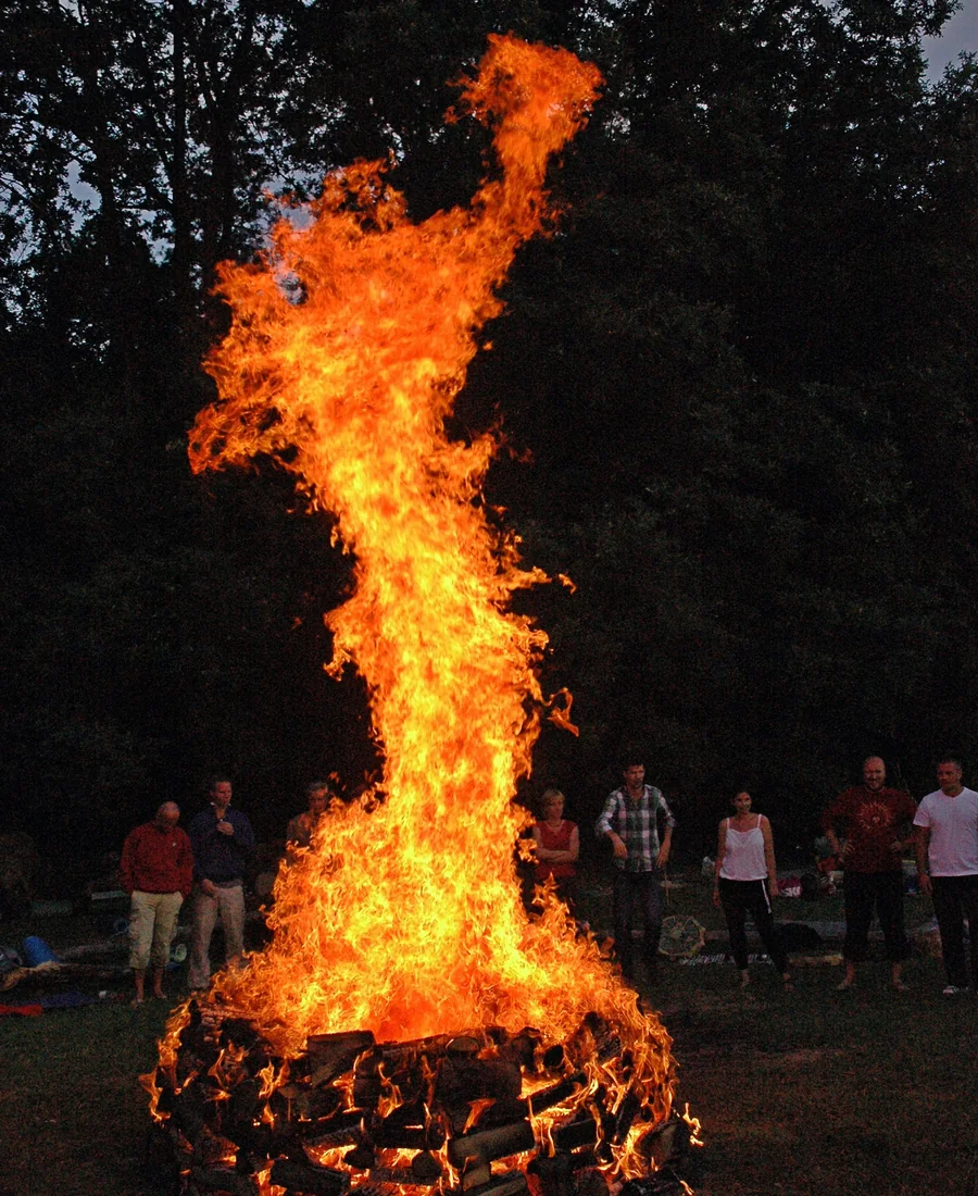A summer fire rising high at a Four Seasons event