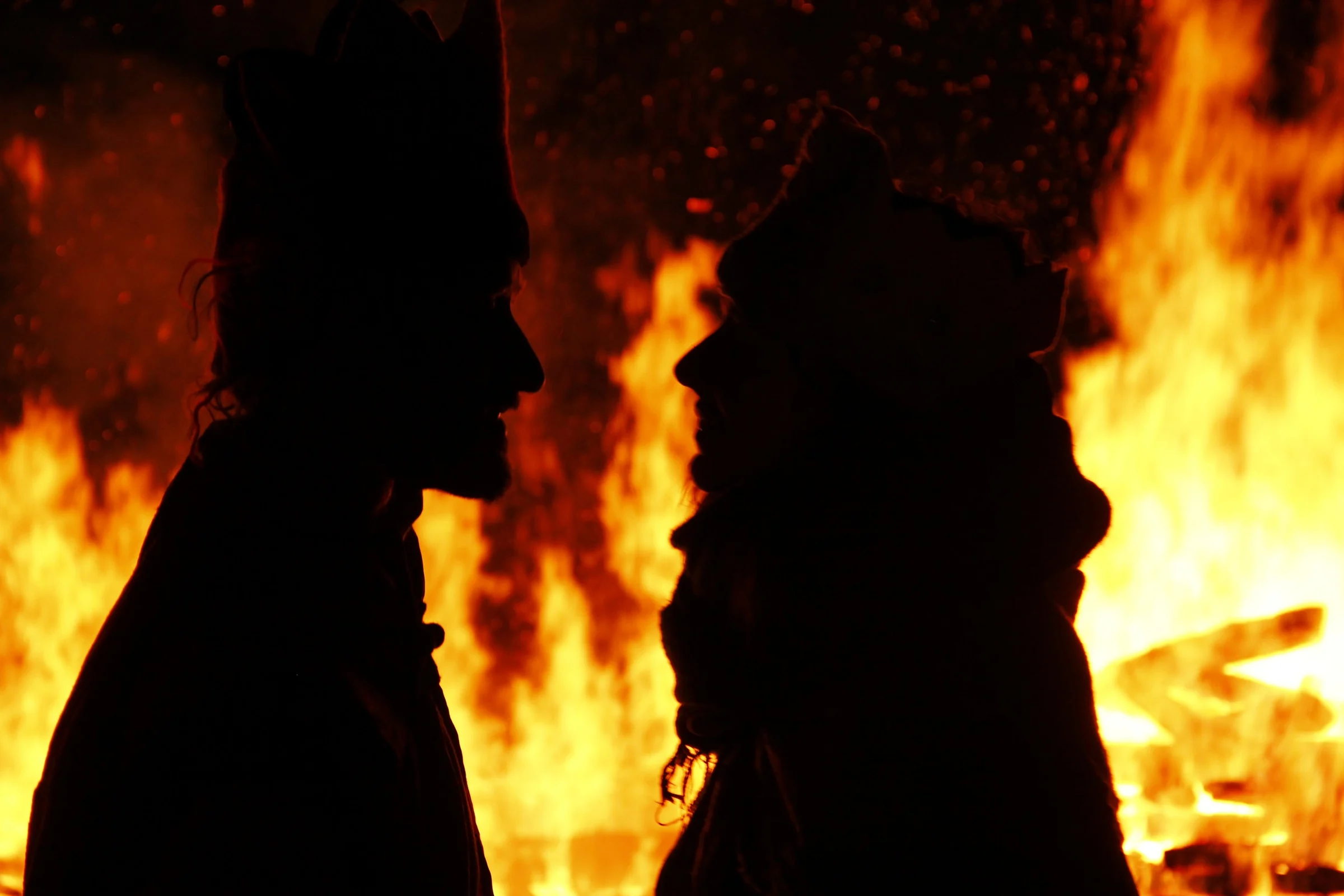 Meeting in the firelight