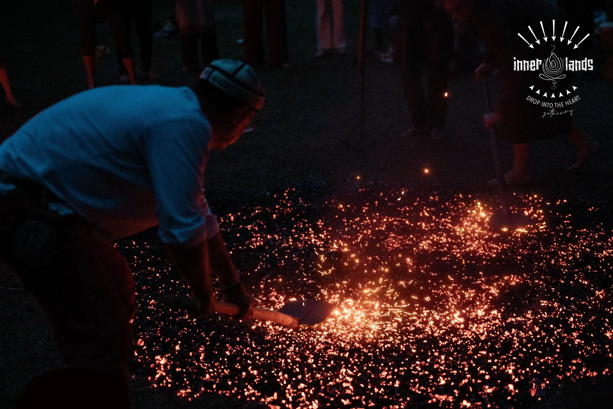 Preparing glowing embers at the Innerlands Gathering in the Netherlands